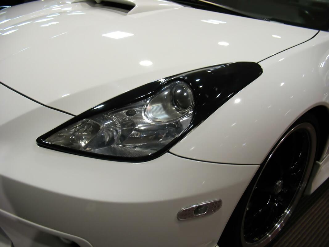 White sports car with paint protection film applied